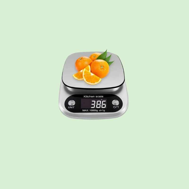 Balance de cuisine digitale en inox pesant des oranges avec précision de 1 g jusqu’à 10 kg
