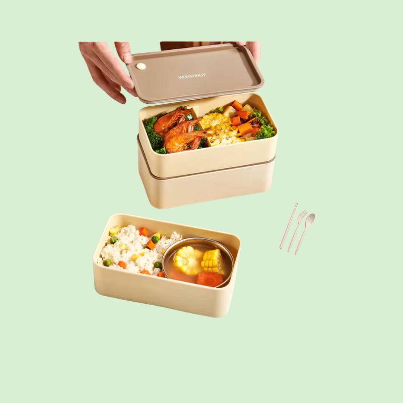 Boîte Bento Double Couche Hermétique montrant les compartiments remplis d’aliments pour un repas complet
