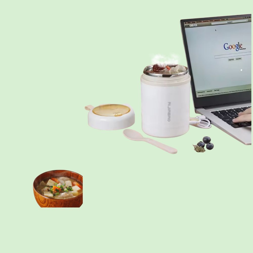 Boîte chauffante électrique inox 0,6 L branchée via USB qui est en train de chauffer les repas