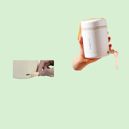 Boîte chauffante électrique inox 0,6 L couleur blanche en train de se charger via USB 