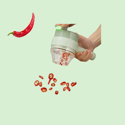 Hachoir et coupe-légumes sans fil 4-en-1 en train de couper un piment.