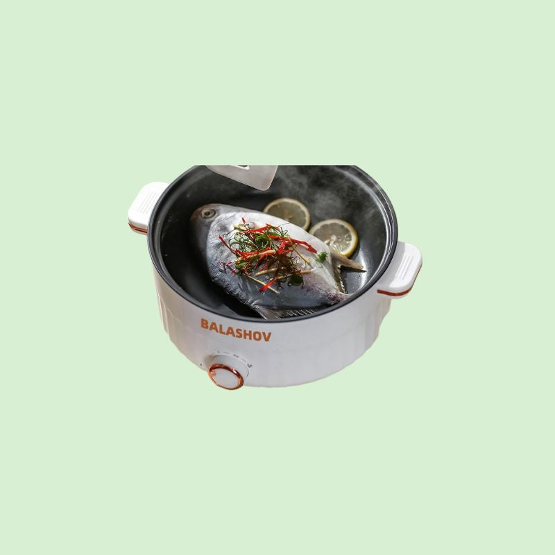 Cuisson de poisson dans une marmite électrique