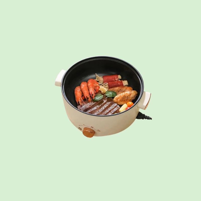 Marmite électrique réalisant une cuisson sautée