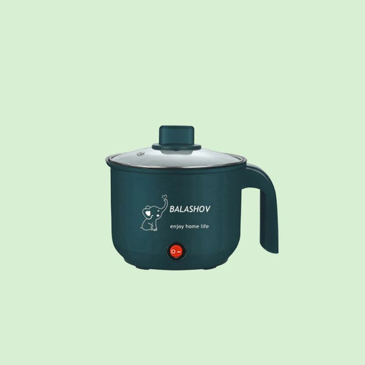 Mini cuiseur électrique posé seul, montrant son design compact et ses fonctionnalités de cuisson.