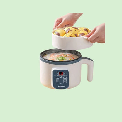Mini cuiseur à riz électrique 1,7L à double couche, permettant la cuisson simultanée de plusieurs plats.