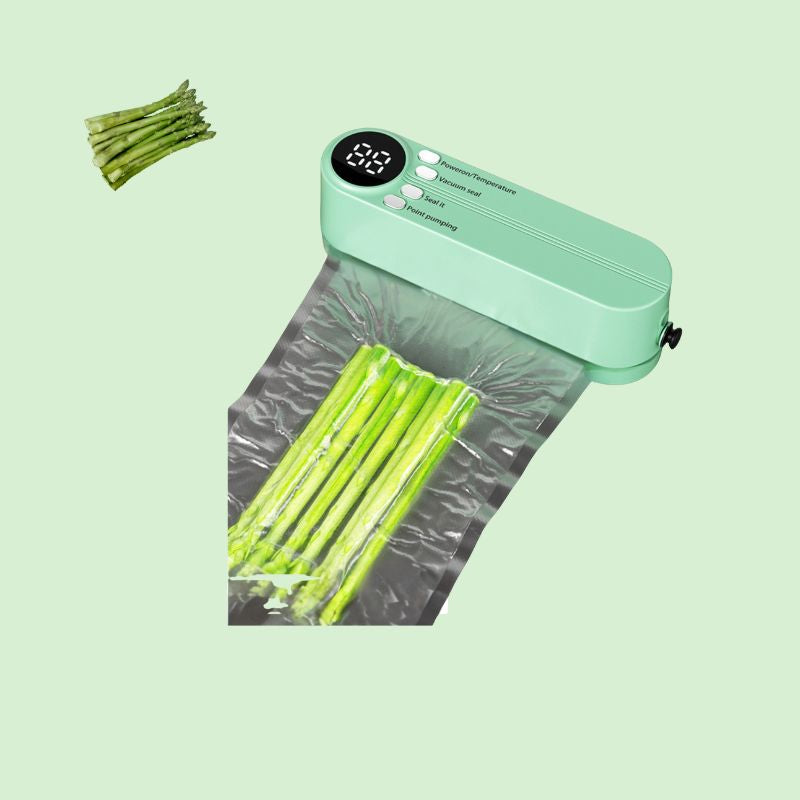 Mini machine sous vide sans fil rechargeable USB en train de sceller des asperges