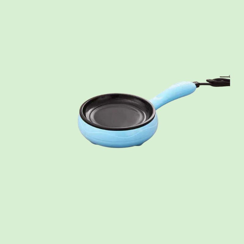 Mini poêle électrique compacte seule, prête pour cuisson rapide et pratique
