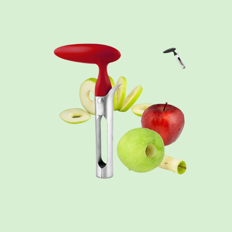 Vide-pomme entouré de pommes, avec une pomme évidée et des rondelles de pomme